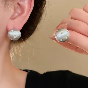 Silver brushed round stud earrings with rhinestone star patterns for women's jewelry