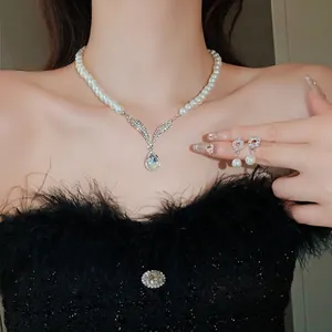 Elegant French style pearl necklace with waterdrop rhinestone pendant and earrings set