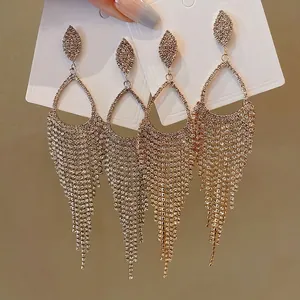 Elegant rhinestone waterdrop tassel earrings with shimmering silver needle studs for women