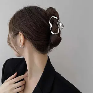 Minimalist silver metal geometric hair claw clip for an elegant and fashionable hairstyle