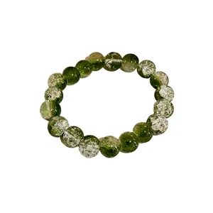 Elegante bracciale elastico con perle di vetro crackle verde sfumato e trasparenti