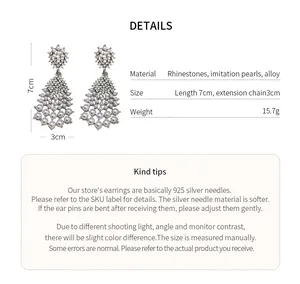 Detailed view of rhinestone tassel pearl earrings with size and material specifications.