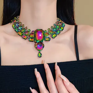 Detail of French retro choker with colorful iridescent rhinestone heart and teardrop