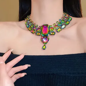 Detailed macro view of retro iridescent rhinestone choker with heart teardrop pendant.