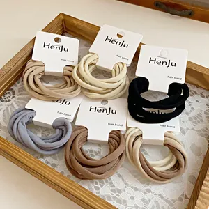 Lot de chouchous en tissu haute élasticité en plusieurs couleurs unies sur cartes