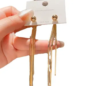 Elegant gold tassel drop earrings featuring long snake chains and S925 silver posts