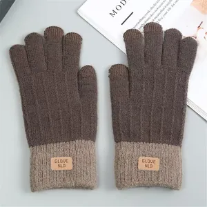 Detailed close-up of brown and beige knit touch-screen gloves with a soft texture