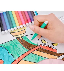 Detailed close-up showing a hand coloring with a green mini washable watercolor marker