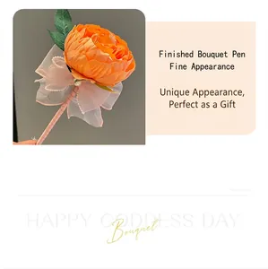Close-up of elegant orange flower pen with ribbon and pearl detail for gift