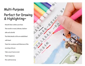 Close-up of child holding pink watercolor pen highlighting text in a book