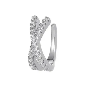 Elegant silver-plated cross ear cuff with micro-paved cubic zirconia for non-pierced ears.