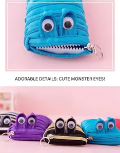 Close-up of cute monster zipper pencil case with googly eyes and unique design