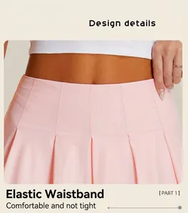 Detail shot of the comfortable elastic waistband on a pink pleated tennis skirt