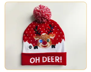 Detail view of a red LED Christmas beanie featuring a reindeer and OH DEER! text.