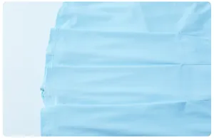 Close-up view of the light blue pleated tennis skirt with fine stitching detail.