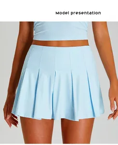 Detail of a breathable light blue pleated tennis skirt for outdoor fitness and yoga