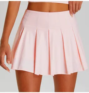 Close-up of a pink pleated athletic tennis skirt with breathable sun protection fabric