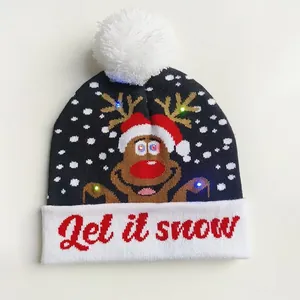 Festive Christmas knit beanie with LED lights featuring reindeer and Let it snow text