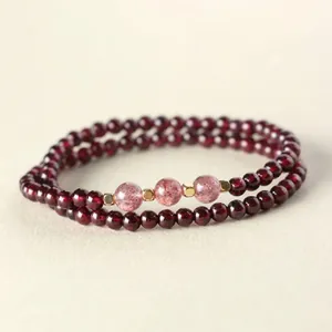Natural red garnet beaded bracelet with decorative pink strawberry quartz beads