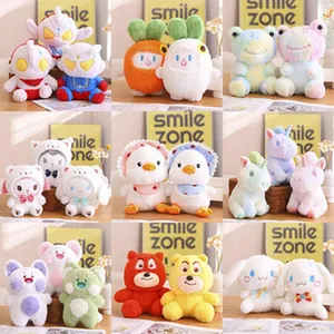 Collection of assorted mini plush toy keychains featuring various cute cartoon animal characters
