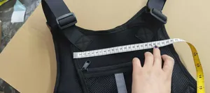 Detailed measurement of a black waterproof tactical vest chest bag for outdoor sports.