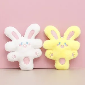 Cute white and yellow plush rabbit keychains with soft texture and embroidered faces