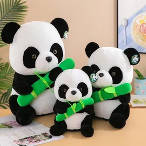 Adorable set of three panda plush toys in various sizes holding soft green bamboo sticks