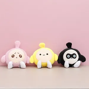Set of three mini plush penguin keychain dolls in pink yellow and black for wedding gifts.