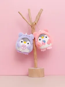 Cute plush penguin keychains featuring purple and pink animal-eared hoods and candy accessories