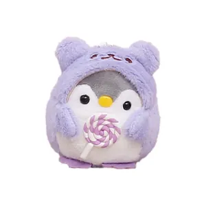 Cute plush penguin keychain wearing purple bear hoodie with a lollipop