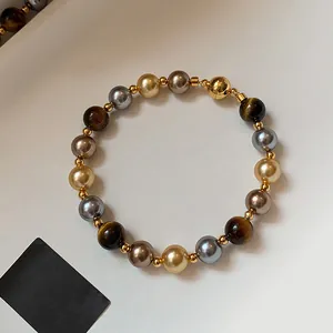 Bracelet vintage style Maillard avec œil de tigre et perles et fermoir magnétique