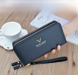 Navy blue long pebbled leather women's wallet with double zippers and wrist strap