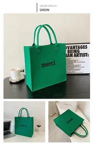 Stylish green felt tote bag featuring merci text shown in a vibrant product detail view