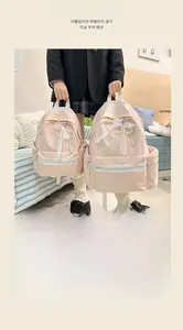 Stylish pink student backpack with delicate lace and pearl bow for school girls