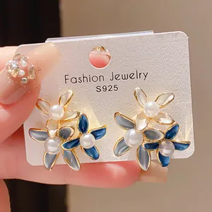 Elegant vintage 18K gold plated flower earrings with pearls and blue enamel finish