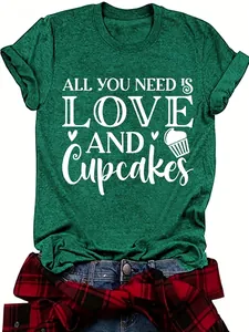 Close-up of women's dark green t-shirt with All You Need Is Love and Cupcakes graphic print