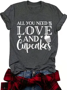 Close-up of women's charcoal grey t-shirt with 'Love and Cupcakes' white graphic print