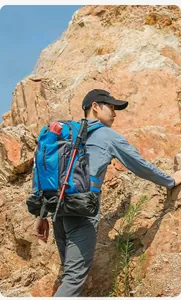 Blue 40L hiking backpack for outdoor trekking and travel with gear attachments