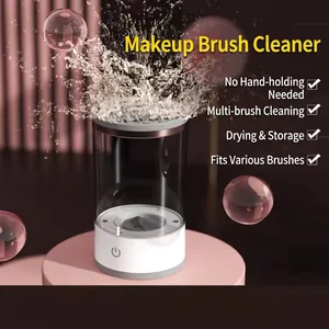 Close-up of electric makeup brush cleaner with water splash and bubble effects