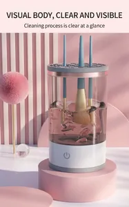 Electric makeup brush cleaner with a transparent body showing the cleaning process