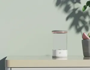 Modern ultrasonic makeup brush cleaner with USB power on a minimalist wooden shelf