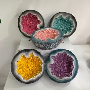Detailed view of colorful resin geode bowls with crystalline texture for home decor