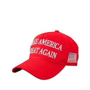Red baseball cap with Make America Great Again embroidery and American flag patch