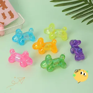 Macro detail of six colorful glitter balloon dog squishy toys for stress relief