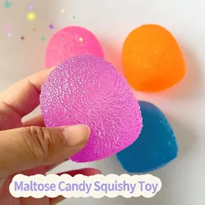 Close-up of purple maltose candy squishy toy with textured surface for stress relief