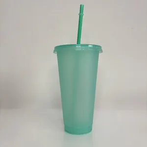 Detailed view of a 24oz green glitter plastic straw cup featuring a matching lid and straw