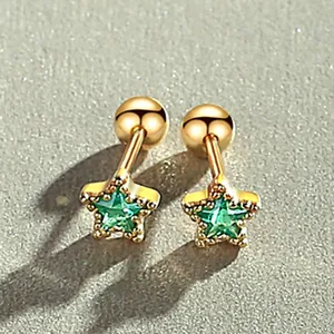 Gold star stud earrings with green zircon stones and screw back for cartilage piercing