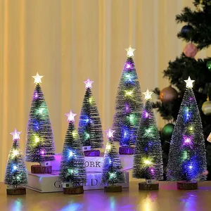 Mini desktop Christmas tree set with colorful LED lights and star toppers.