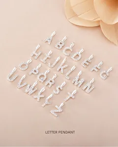 Detailed view of micro-pave crystal A-Z alphabet letter pendants in S925 sterling silver