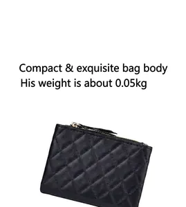 Detailed shot of a black quilted leather coin purse with zipper, weighing only 0.05kg